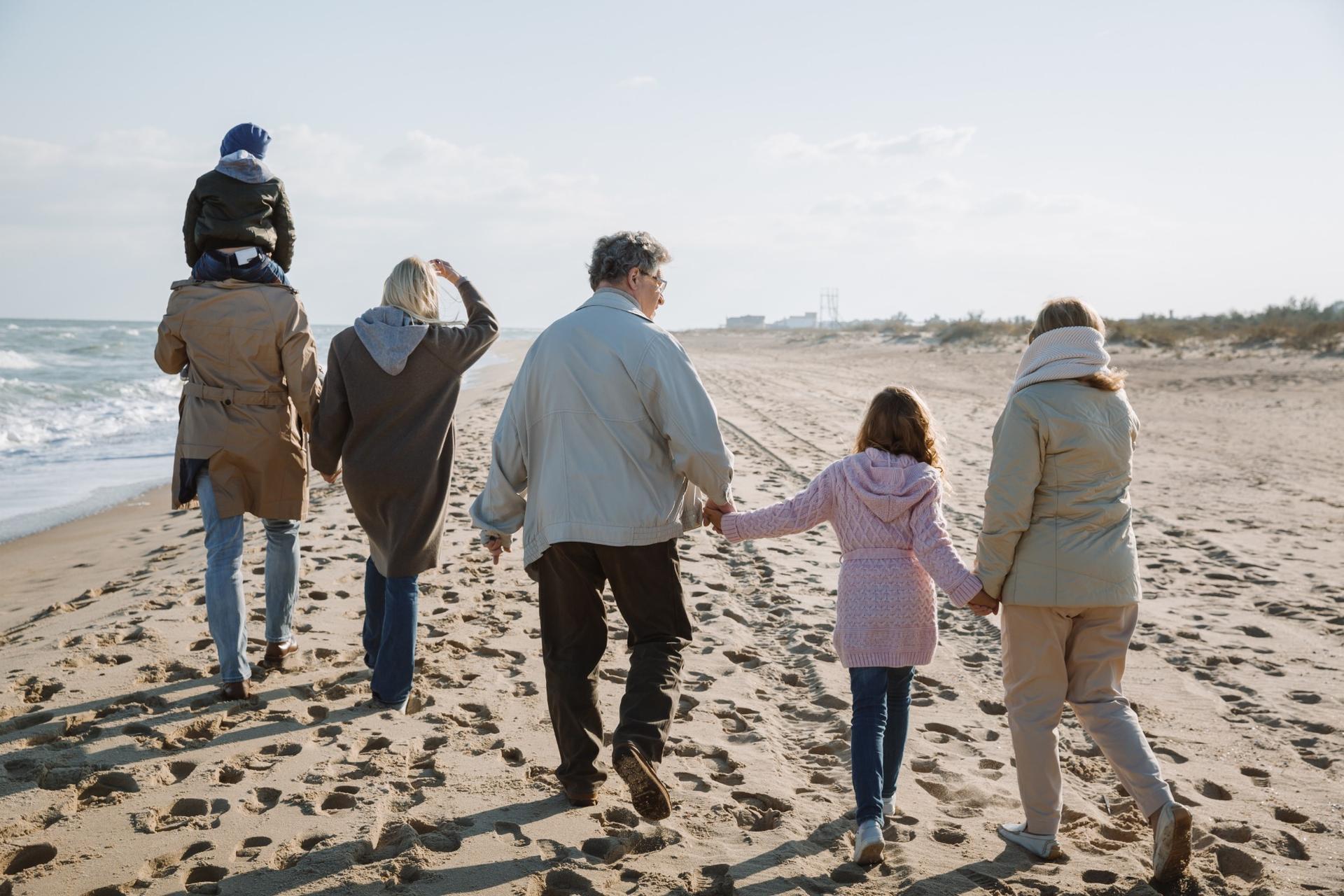 family-beach-walk-1920w-proportional